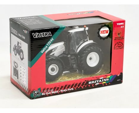 An unused Britains Valtra TZ54V tractor in box. Die-Cast Model and Plastic Parts. 22x12.5x15cm 