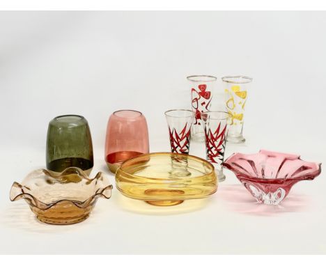 A collection of Art Glass. Amber Swirl fruit bowl 26x21x10cm. 4 tall drinking glasses 18cm. A Czech glass bowl 23x23x9cm. A p