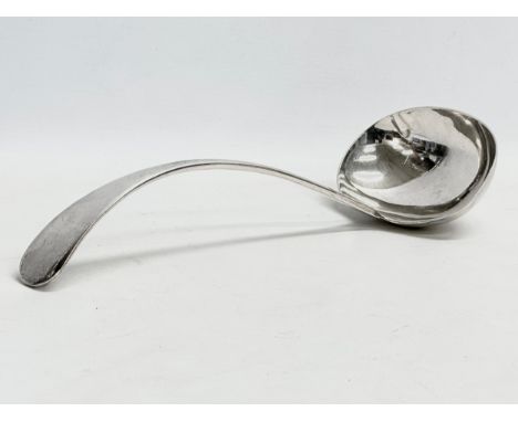 A large heavy silver ladle. Sheffield, 1919. 300 grams. 31cm 