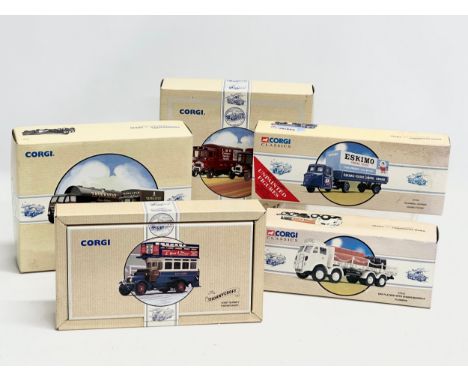 5 boxes of Corgi model trucks. 