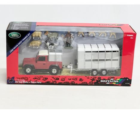 An unused Britains Land Rover Sheep Farmer Set. 1:32 scale. Die-Cast Model and Plastic Parts. 35x10x15cm 