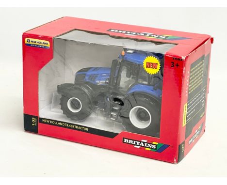 An unused Britains “New Holland” T8.435 Tractor in box. 1:32 scale. 25x13x15.5cm 