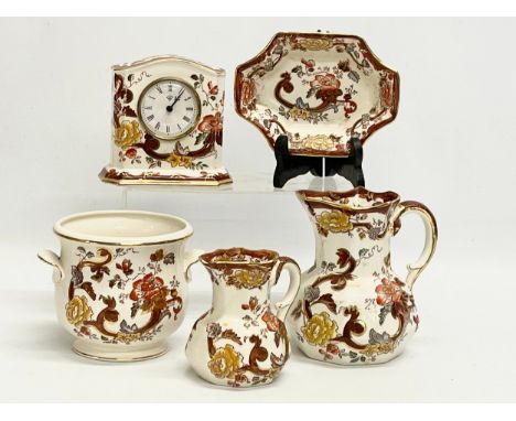 5 pieces of Mason’s ‘Brown Velvet’ mantle clock 13x13cm. Jardiniere 17x14x12cm. Largest jug 14x16cm. 