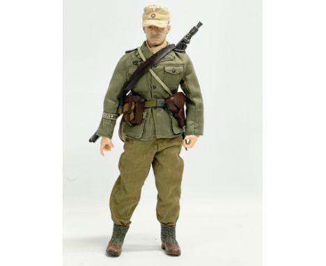 A Dragon Models LTD WW2 German 1/6 scale action figure. Africa 31.5cm 