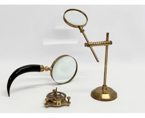 A Sunday lot. A vintage brass desktop telescopic magnifying glass 25cm, a horn handled and brass magnifying glass 25cm and a 