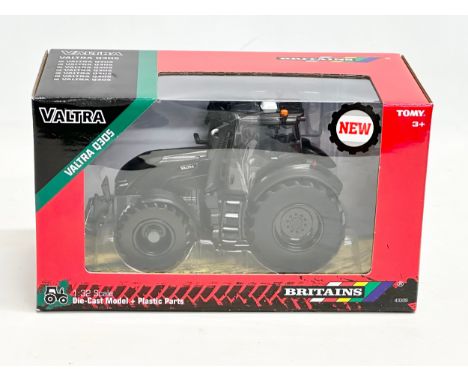 An unused Britains Valera Q305 tractor in box. 1:32 scale. Die-Cast Model and Plastic. 25x12x15cm 