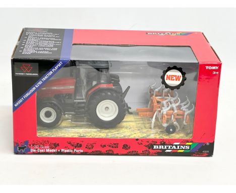 An unused Britains Massey Ferguson 6Z90 Tractor Playset in box. 1:32 scale. Die-Cast Model and Plastic Parts. 28x16x14cm 