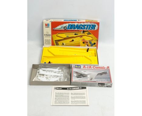 A vintage Dragster game and a Revell A-7A Corsair II model in box. 