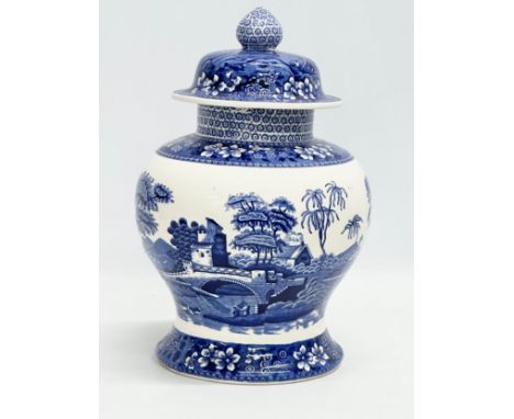 A Spode ‘Blue Tower’ jar with cover. 18x29cm 
