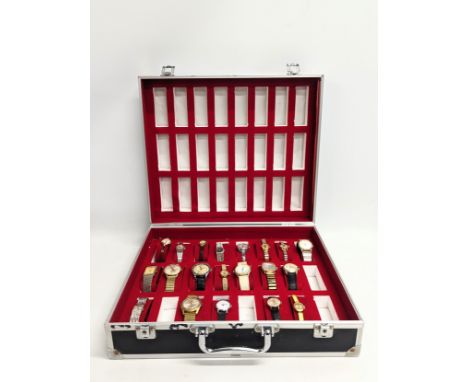 A collection of vintage ladies and gents watches in case 