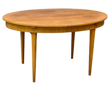 A Greaves &amp; Thomas 1960’s Mid Century teak extending dining table. Open 142.5x137x74cm. Closed 142.5x97x74cm 