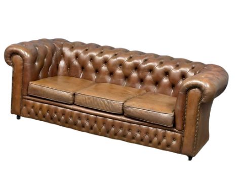 A vintage deep button leather 3 seater sofa. 191cm 