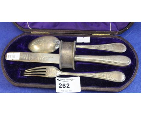 Cased four piece Christening set comprising knife, fork, spoon and napkin ring, London hallmarks.