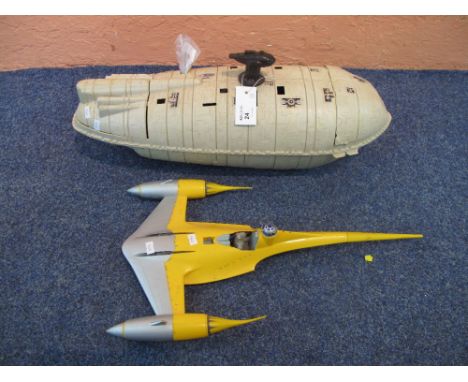 Vintage Star Wars rebel transport vehicle together with a Naboo fighter and pilot.  (2)