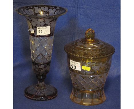 Amber flash cut glass jar and cover with hobnail and foliate decoration, together with a similar ruby flash cut trumpet vase 