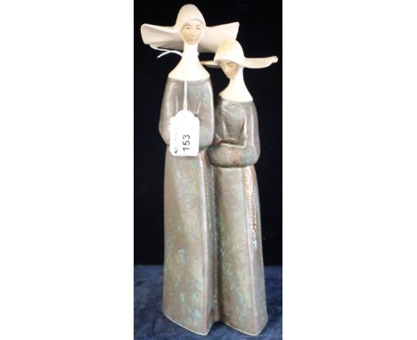 Lladro figure group of two Nuns with rosaries, printed and impressed marks to base, boxed.