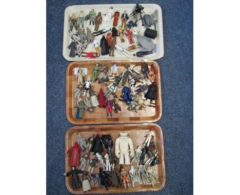 Three trays of vintage and other Star Wars figures to include Ewok, R2D2, Han Solo, Chewbacca, Darth Vader, Darth Maul etc., 