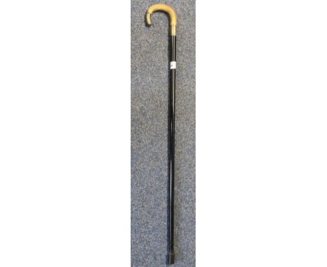 Ebony and horn gentleman's walking cane with silver collar and finial.  Birmingham hallmarks, makers initials JH.