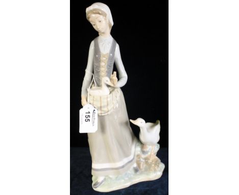 Lladro figurine of female with ducks.  Impressed and printed marks to base.  Boxed.