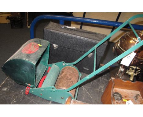 "The Webb miniature lawn mower four children", a roller mower with collecting box.
