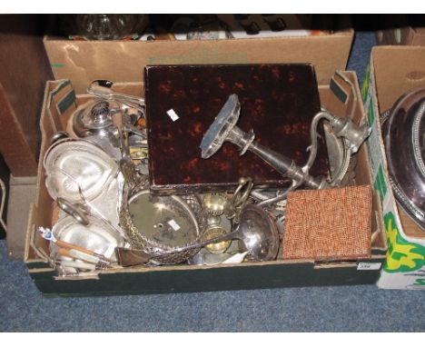 Tray of assorted metal ware to include plated candelabra, various loose plated cutlery, pierced cake basket, silver plated te