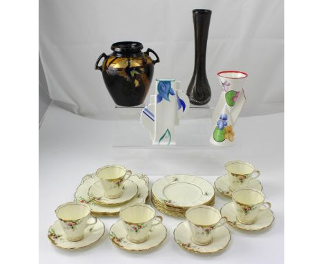 A c1930s Tuscan Art Deco hand-painted gilt-heightened six-place tea service to include six cups, saucers, plates and two sand