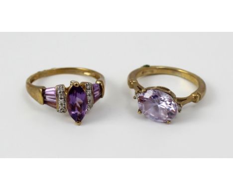 A 9ct gold ladies' dress ring set with central oval amethyst and small white stone to either shoulder, size L and a 9ct gold 