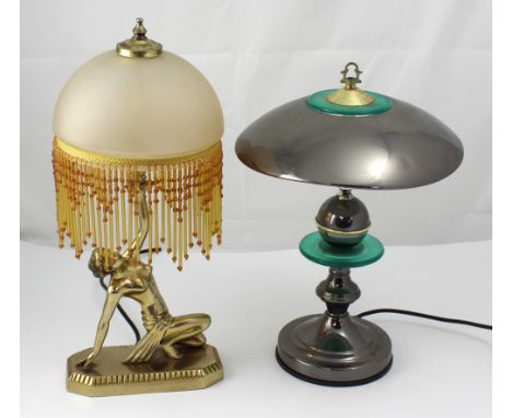 An Art Deco style table lamp in the form of a naked female and one other (2).