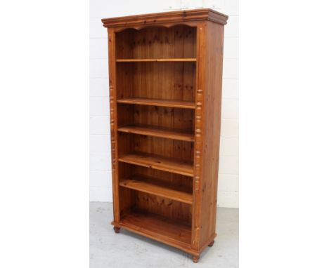 A contemporary pine five-shelf open bookcase, width 93cm.