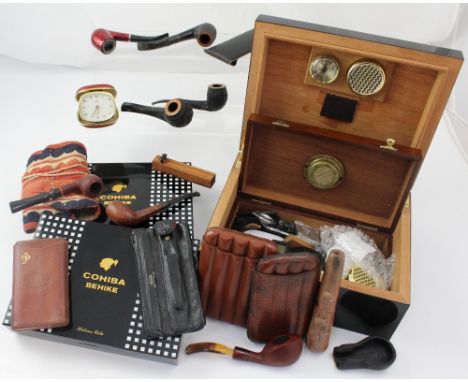 A quantity of smoking-related items to include tobacco boxes, cigar boxes, various pipes to include examples by M. Pilar, Ros