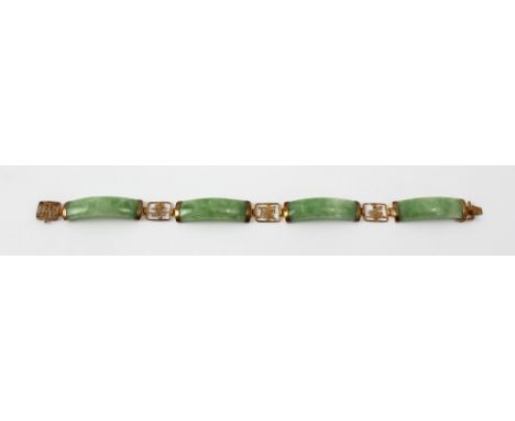A 9ct gold and jade link bracelet.