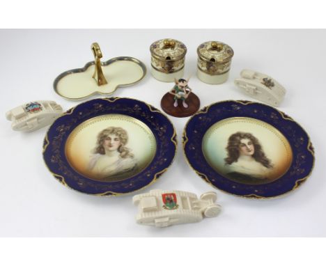 A pair of Vienna-style Continental wall plates, each with transfer decoration of beautiful young woman within a cobalt and gi