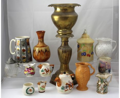A quantity of ceramics to include a Royal Worcester 'Evesham' biscuit barrel, a Wade jug etc and a large brass jardinière on 
