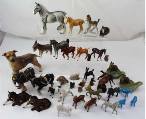 A collection of predominantly ceramic horses to include Beswick examples, also a Coopercraft dog etc.