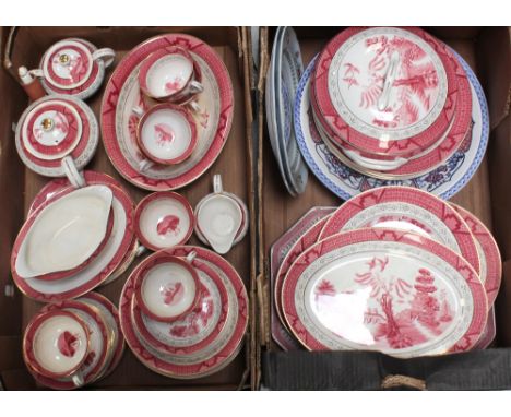 A quantity 'Double Phoenix' dinner and teaware, white ground with willow pattern in pink, to include dinner plates, tureens, 