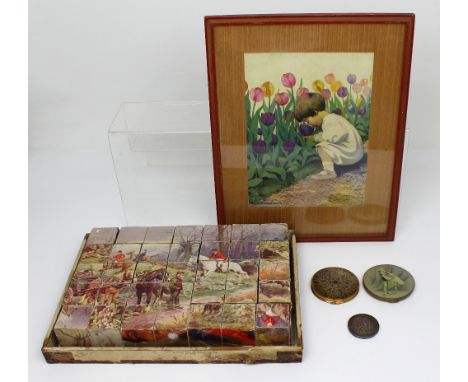 A set of early-to-mid 20th century pictorial building blocks and Jesse Wilcox Smith; a print of a young child smelling tulips