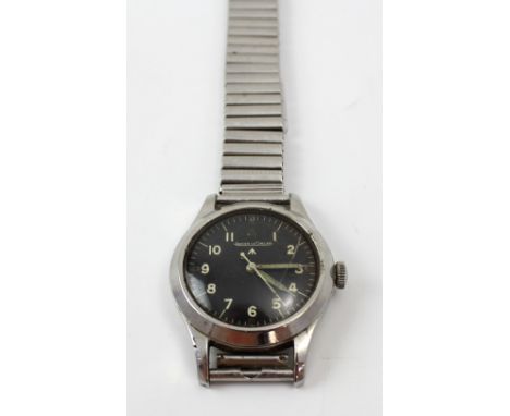 Jaeger le Coultre; a British military issue stainless steel backed, manual-wind wristwatch, the black dial set with Arabic nu