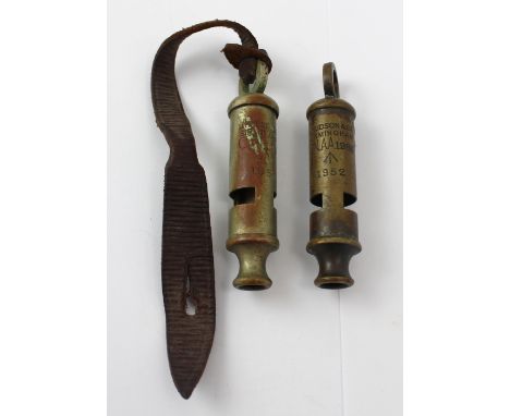Two J Hudson & Co of Birmingham military whistles, one dated 1952, the other 1956, both with broad arrow mark (2).