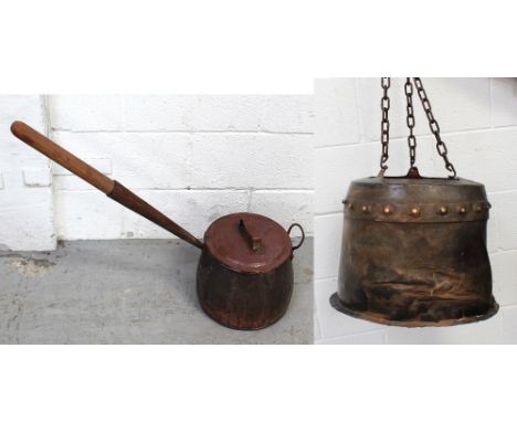 A copper pot converted into a lamp shade, height 33cm and a further wooden-handled copper pot (2).