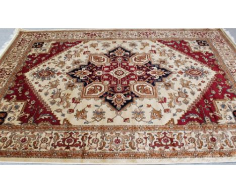 A modern beige ground Heriz Carpet, 280 x 200cm.
