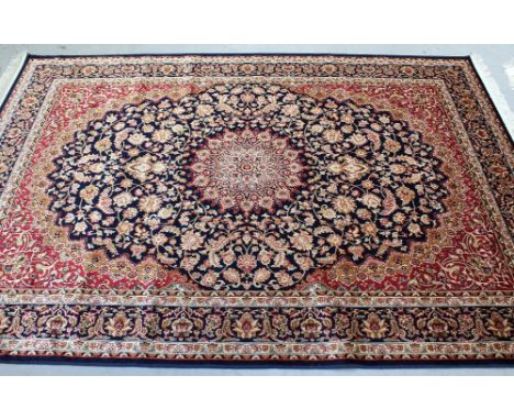A modern blue ground Keshan carpet, 230 x 160cm.