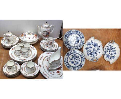 Eight late 19th/early 20th century Meissen blue onion pattern plates, two matching comport leaf-shaped plates, with crossed s