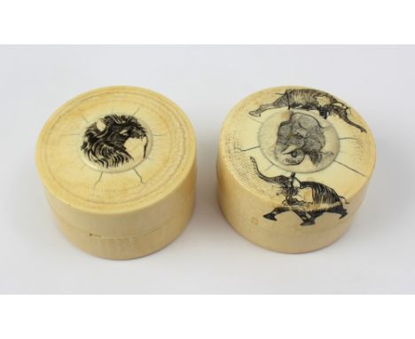Two early 20th century ivory engraved trinket boxes to include an elephant decorated example, diameter 7cm (2).