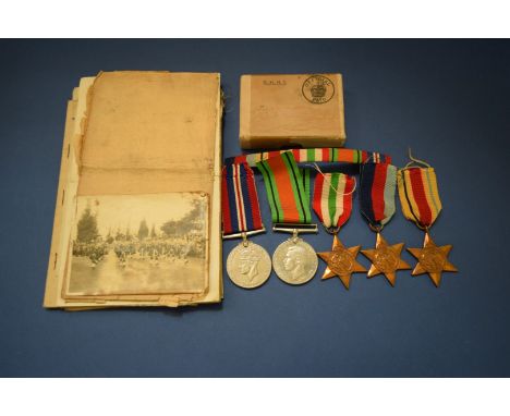 A World War II medal group of five, to: 2886016 Pte. Robert John Laurenson, Gordon Highlanders; together with various related