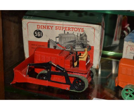Two Dinky Supertoy boxed vehicles, comprising: 561 Blaw Knox Bulldozer; and 563 Heavy tractor.