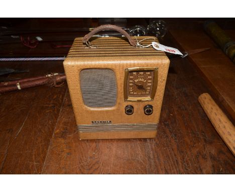 A vintage Detrola Pee-Wee portable radio.