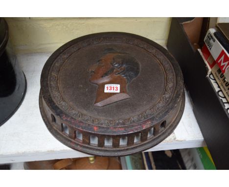 A cast iron portrait plaque, 31cm diameter.