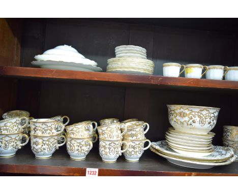 A Victorian white and gilt porcelain part tea service; together with another part tea service.