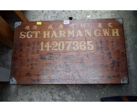 A 1940s oriental teak army trunk, ingraved 'Sgt. Harman GWH, 14207365, and further inscribed with oriental script, 61.5cm wid