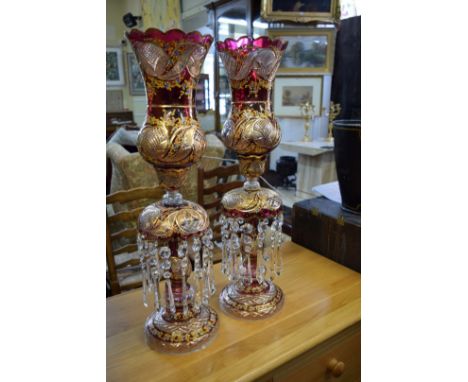A pair of large Bohemian ruby stained storm lamp lustres, 65cm high. 
